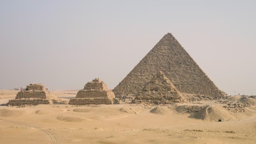 The Giza Plateau Of Egypt With The Great Pyramid Complex During Sunrise. Static Shot
