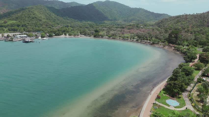 Aerial footage from a drone highlights the Chaguaramas boardwalk and Williams Bay on the Caribbean island of Trinidad.