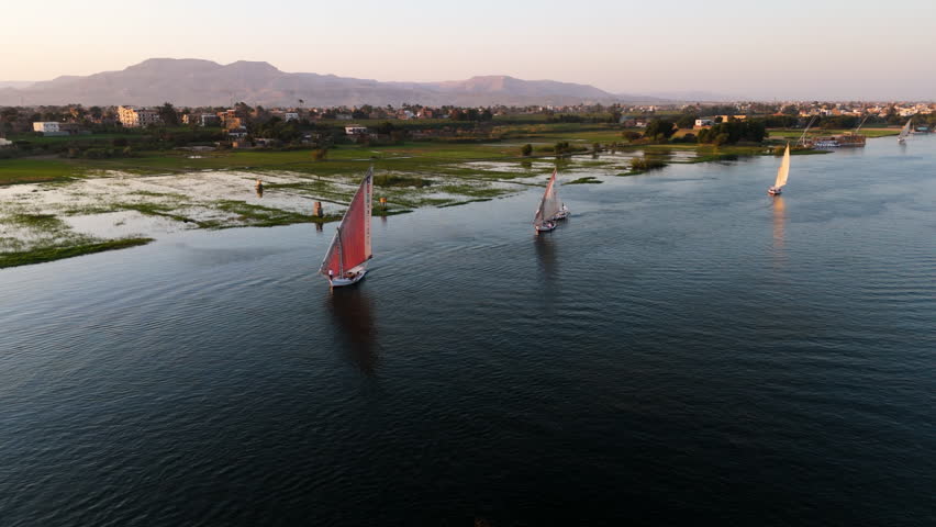 Feluccas Sailing On Nile River In Luxor, Egypt - Aerial Shot