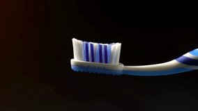 Applying white toothpaste on a toothbrush, Toothbrush on blurred background 4k slow motion. Hand spreading toothpaste on black background - Powered by Shutterstock - Get 15% off with code: PIKWIZARD15