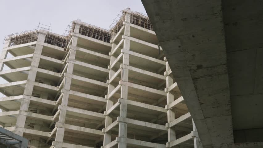 Featuring of concrete framework of building under construction in Karachi, Pakistan.