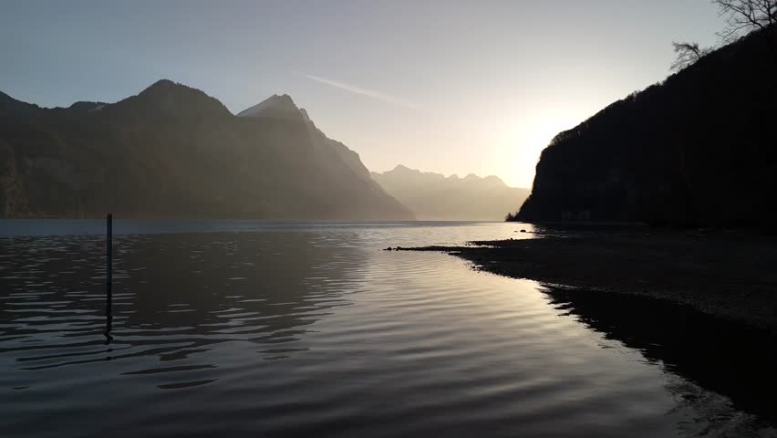 Nature morning mist over lake Switzerland Walensee mountain skyline nature