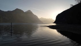 Nature morning mist over lake Switzerland Walensee mountain skyline nature - Powered by Shutterstock - Get 15% off with code: PIKWIZARD15
