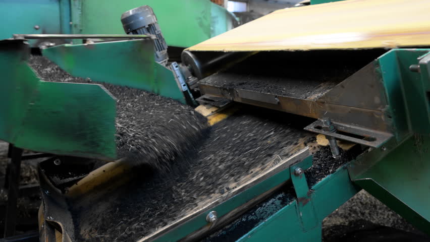 Close up of tire fragments after the recycling process, highlighting eco friendly material recovery.