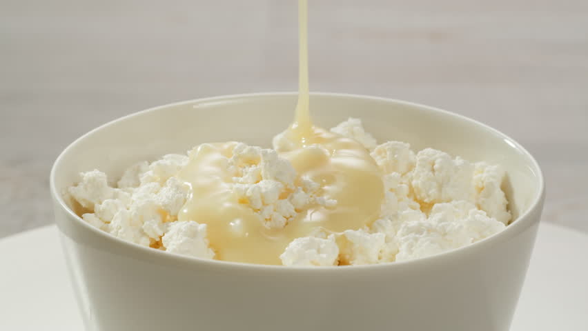 Cottage cheese and Fresh milk yougurt and yogurt, youghurt, kefir, ayran, lassi in glass with berries fruits, Probiotic cold fermented dairy drink, tasty breakfast..