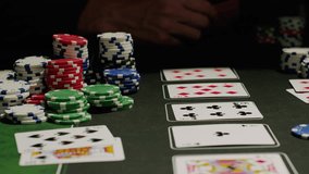 Game of poker in casino, taking place with poker chips and cards on a green table, gambling place, roulette jack pot.  - Powered by Shutterstock - Get 15% off with code: PIKWIZARD15