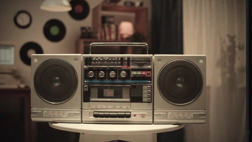 Retro music radio tape recorder, audio cassette playing close-up VHS. Listening to music, recording studio old radio boombox player, searching channel, volume. 