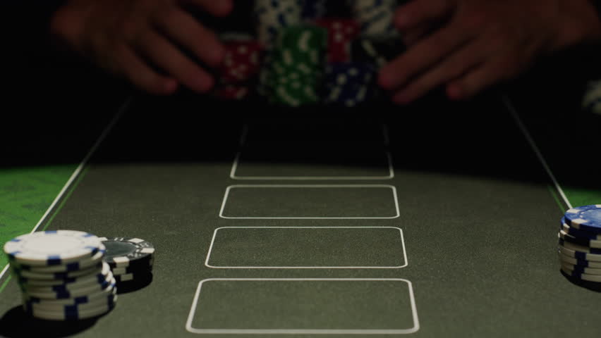 Game of poker in casino, taking place with poker chips and cards on a green table, gambling place, roulette jack pot. 