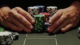 Game of poker in casino, taking place with poker chips and cards on a green table, gambling place, roulette jack pot.  - Powered by Shutterstock - Get 15% off with code: PIKWIZARD15