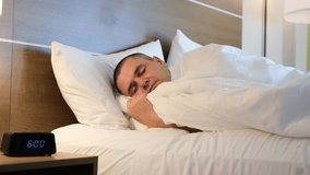 The morning routine of waking up and jumping out of bed in surprise when the alarm clock rings loudly - Powered by Shutterstock - Get 15% off with code: PIKWIZARD15