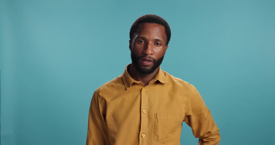 Studio, black man or facepalm with regret for mistake, startup fail or bad decision for designer. Mockup space, male person or entrepreneur with hand for shame emoji, disappointed or blue background