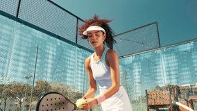Padel tennis, serve and ball with woman on court for competition, training and performance. Game, sports workout and fitness club with person in match for athlete, exercise and racket tournament - Powered by Shutterstock - Get 15% off with code: PIKWIZARD15