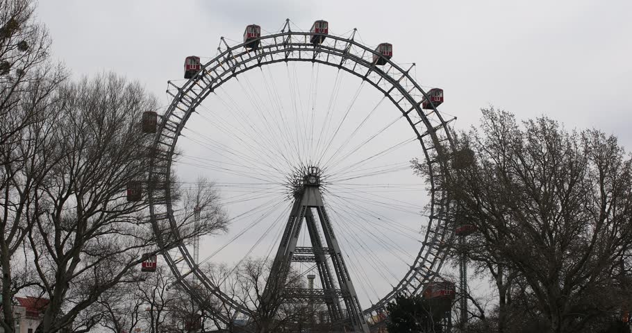 The historic Vienna Ferris Wheel in Prater park with its iconic red gondolas and steel frame was built in 1897 for Emperor Franz Josef I's Golden Jubilee celebration