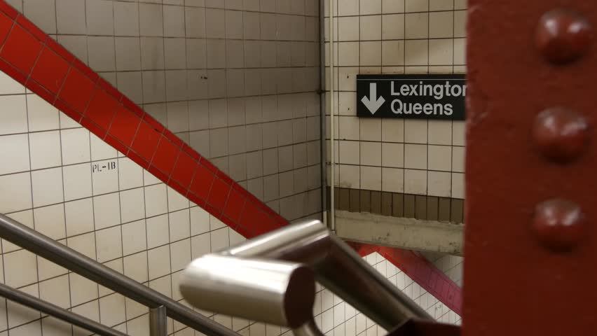 New York subway station interior. Text sign: Lexington, Queens. Manhattan underground metropolitan. United States metro transport navigation. Information signage public passenger railway. NYC Midtown.