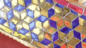 Blue with gold mosaic pattern in wall. - Powered by Shutterstock - Get 15% off with code: PIKWIZARD15