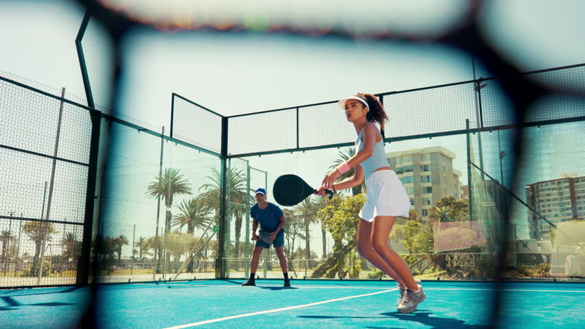 High five, sports or winner with Padel team on court together for points scoring or success. Exercise, fitness or motivation with people in tennis venue for celebration, challenge or competition