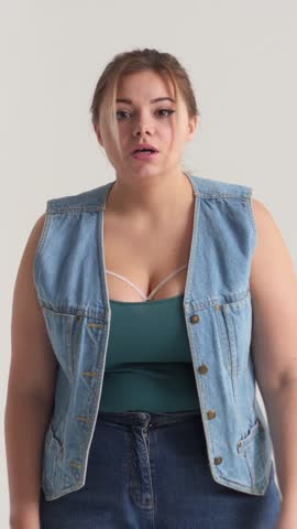 Portrait Of An Irritated Woman Yelling On White Background