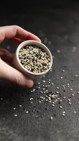 Sesame spice mix white black tasty fresh food background on table rustic food top view copy space