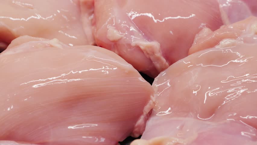 Raw chicken meat. Chunks of fresh organic meat. Prepare dish with chicken on pan. High quality 4k footage
