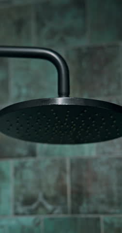 Hygiene, shower and water for cleaning in bathroom of home, hotel or resort to relax or wash. Hot, skincare and wellness with flow or spray in luxury apartment for accommodation and hospitality
