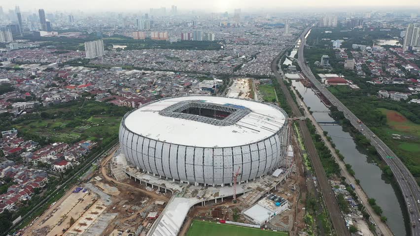 Jakarta, Indonesia, December 16, 2021.View of Construction of new football stadium for upcomming Indonesia Team. Jakarta International Stadium in the North Jakarta. Selective focus on floor or grass.