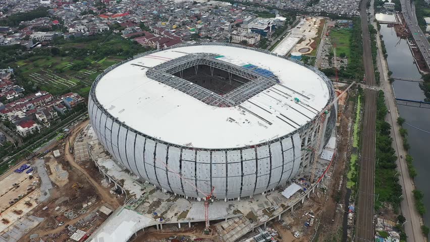 Jakarta, Indonesia, December 16, 2021.View of Construction of new football stadium for upcomming Indonesia Team. Jakarta International Stadium in the North Jakarta. Selective focus on floor or grass.