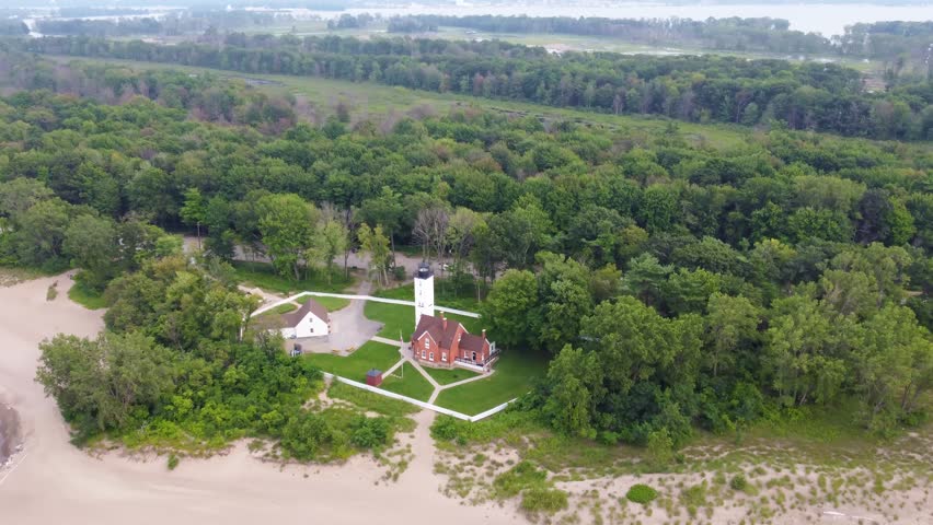 Presque Isle State Park’s beauty unfolds in this aerial footage—soft beaches, rolling waves of Lake Erie, and tree-covered landscapes all in one view.