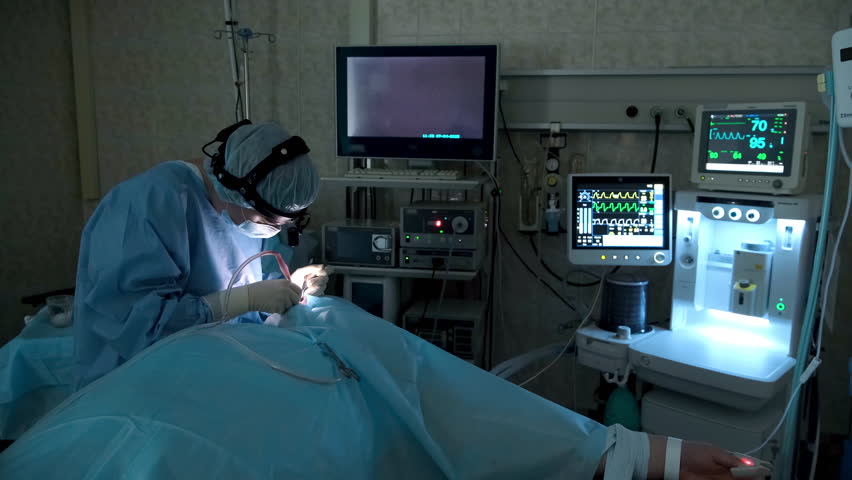 Highly skilled surgeon meticulously performs a complex surgical procedure, utilizing advanced medical equipment in a sterile operating room environment, demonstrating precision and expertise - Powered by Shutterstock - Get 15% off with code: PIKWIZARD15