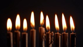 A beautifully lit menorah with glowing candles represents the warmth of Hanukkah, illuminating the festive atmosphere. This sacred ritual signifies faith and heritage in Jewish culture. - Powered by Shutterstock - Get 15% off with code: PIKWIZARD15