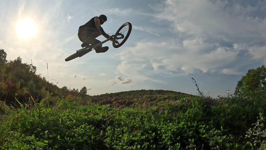 Extreme sports mountain bike jump trick autumn trails