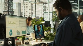 Worker in office talking with manager supervising tasks progression during online videocall. Employee discussing with supervisor overseeing work done during remote teleconference meeting, camera B - Powered by Shutterstock - Get 15% off with code: PIKWIZARD15