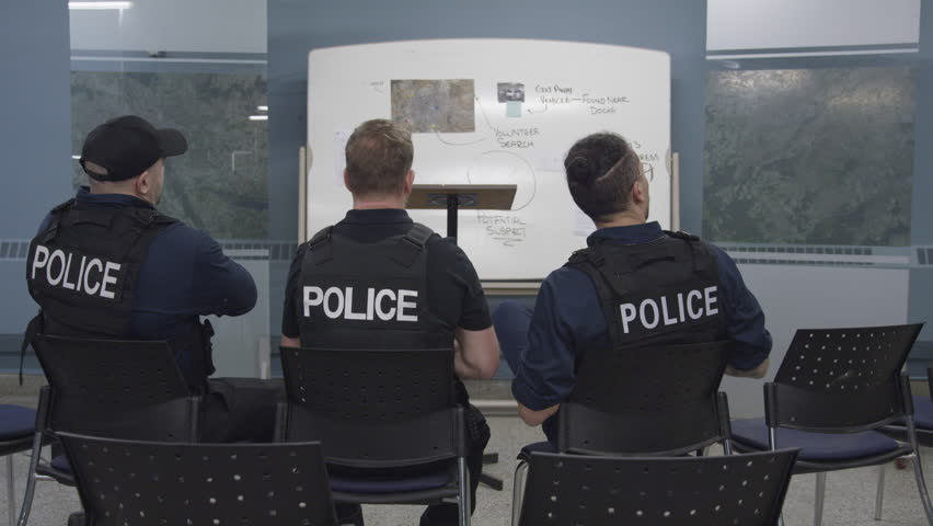 Police chief walks in on group of police officers