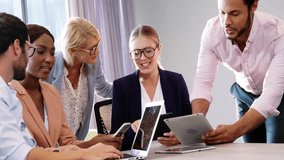 Collaborating in office, diverse business team engaging with digital animation overlay. Teamwork, collaboration, technology, innovation, professionals, corporate - Powered by Shutterstock - Get 15% off with code: PIKWIZARD15