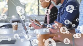 Working on laptops with network connections and animation of user icons overlay. Technology, networking, digital, communication, teamwork, collaboration - Powered by Shutterstock - Get 15% off with code: PIKWIZARD15