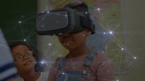 In school, child using VR headset with animation of digital network connections. Virtual reality, technology, innovation, education, immersive, futuristic - Powered by Shutterstock - Get 15% off with code: PIKWIZARD15