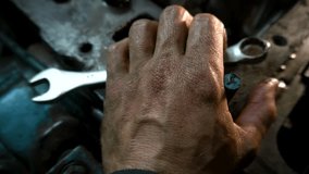 repair of an old blue tractor in a vintage garage, dismantling and installation of a gearbox, replacement of bearings - Powered by Shutterstock - Get 15% off with code: PIKWIZARD15