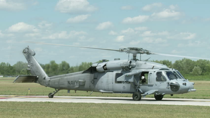 US Navy Sikorsky MH-60S Sea Hawk (aka. Knighthawk) helicopter takes off and hovers before flight.