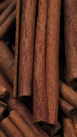 Zoom frame cinnamon sticks close up, rotation