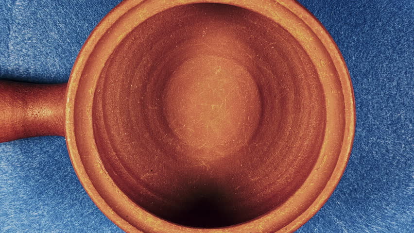 Turkish Coin Money Fill in a Ceramic Clay Pot Stop Motion