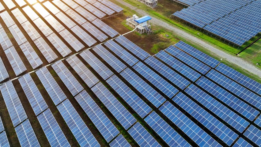 From above, the solar panels represent a shift towards green energy solutions, emphasizing the environmental benefits of solar power in reducing reliance on fossil fuels and combating climate change.
