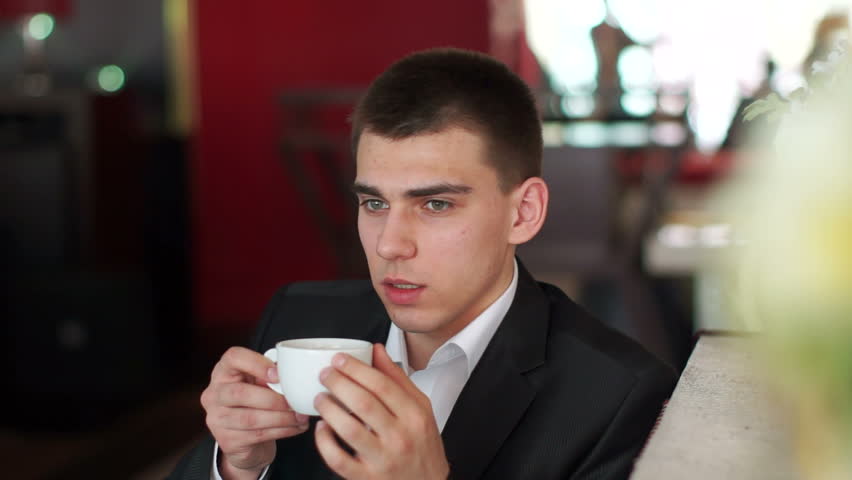Man enjoying coffee and thinking about something