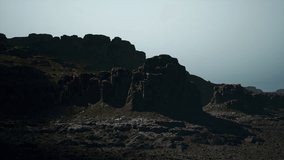 A Majestic Desert Monolith Rising Amidst the Barren Sands - Powered by Shutterstock - Get 15% off with code: PIKWIZARD15