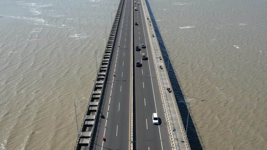 Surabaya, Indonesia - February 7, 2022 : Aerial view of the Suramadu Bridge connecting Java and Madura Island. Madura Landmark.