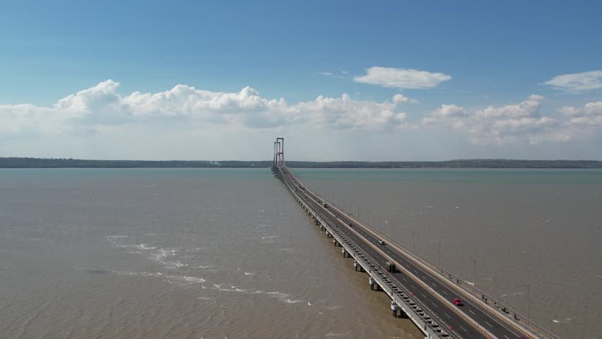 Surabaya, Indonesia - February 7, 2022 : Aerial view of the Suramadu Bridge connecting Java and Madura Island. Madura Landmark.