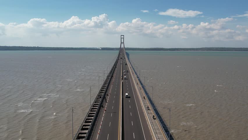 Surabaya, Indonesia - February 7, 2022 : Aerial view of the Suramadu Bridge connecting Java and Madura Island. Madura Landmark.