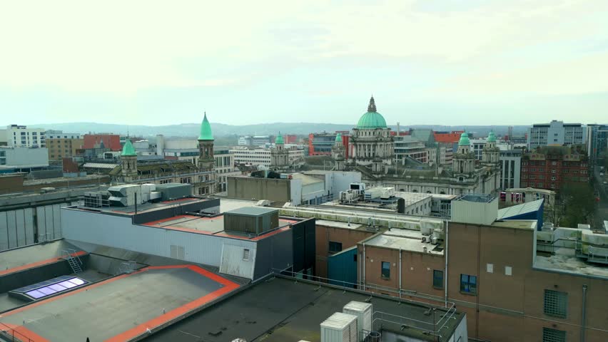 Rising aerial shot of Belfast City Hall on a Spring day. Filmed in 60FPS, with Rec709 colour and in 4K resolution.