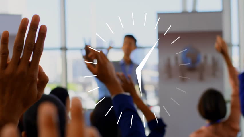 Clock animation over diverse audience raising hands in conference setting. participation, diversity, engagement, seminar, workshop, networking