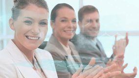 Clapping, business professionals with animation of holographic technology in modern office. innovation, teamwork, corporate, digital, futuristic, collaboration - Powered by Shutterstock - Get 15% off with code: PIKWIZARD15