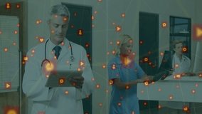 Using digital devices, medical professionals with social media icons overlay in hospital. Healthcare, technology, connectivity, innovation, communication, networking - Powered by Shutterstock - Get 15% off with code: PIKWIZARD15