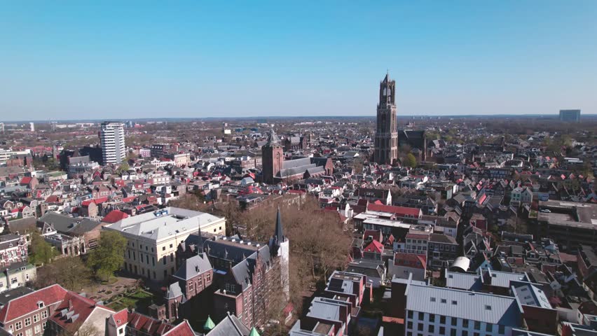 Utrecht town аerial drone view from above, typical Dutch city skyline, Utrecht cityscape with Dom tower, canals and houses, Holland, Netherlands